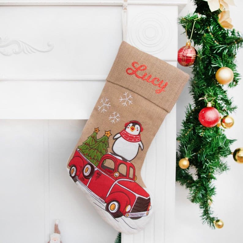 This penguin Christmas stocking is made of cotton and burlap with a cartoon applique pattern. This would be a beautiful ornament wherever you hang your stockings, also would be a great gift for your family and friends. 
