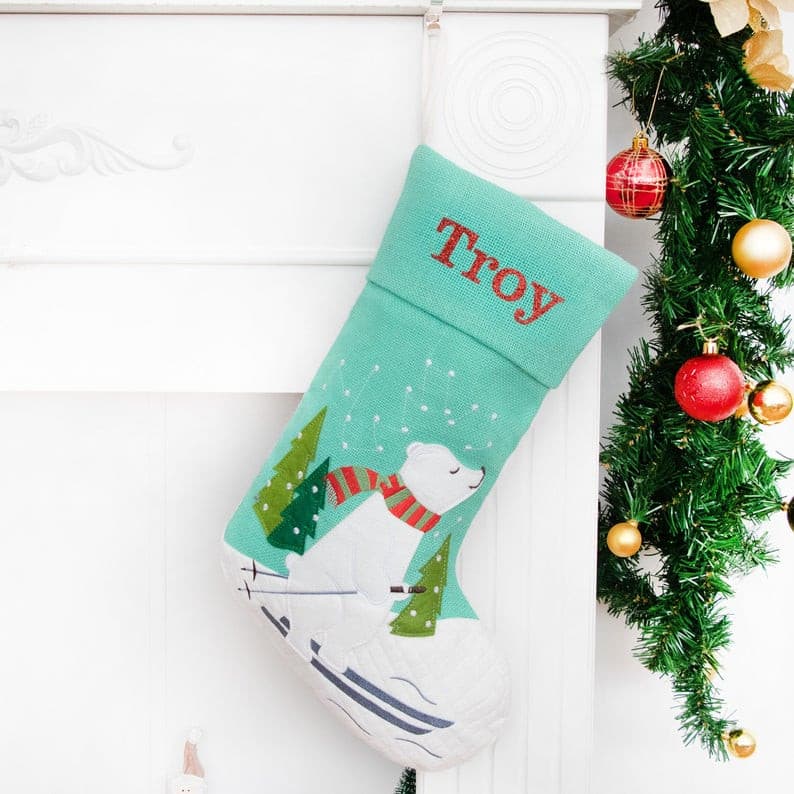 This polar bear penguin Christmas stocking is made of cotton and burlap with a cartoon applique pattern. This would be a beautiful ornament wherever you hang your stockings, also would be a great gift for your family and friends. 